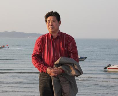 与山传神 与花写照—浅析马健郡的国画