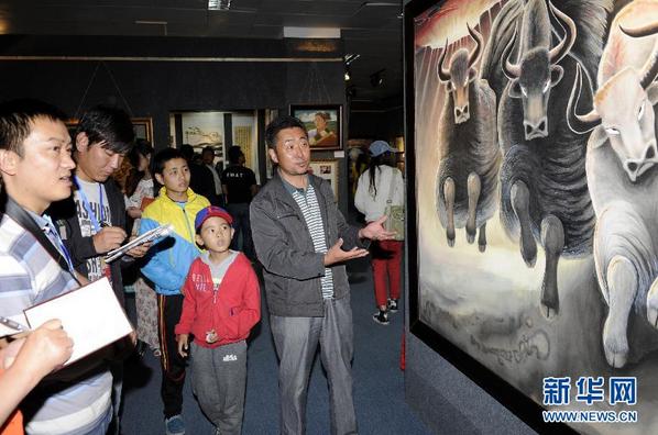 ���أ��������С�ѩ�ٽڡ��黭չ