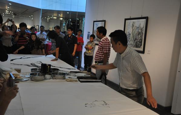 2013�к�ˮī��������չ ڹ���к��黭ͬԴ