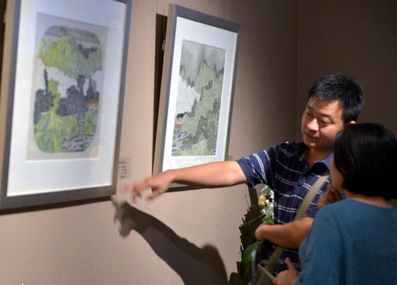 ����Ԫ�й�ɽˮ����Ʒչ���Ļ