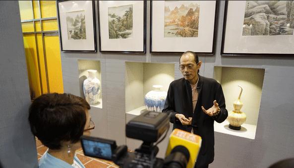 �������Ҷ�ϣԴ������Ʒչ�ڰ������չ�¡����Ļ