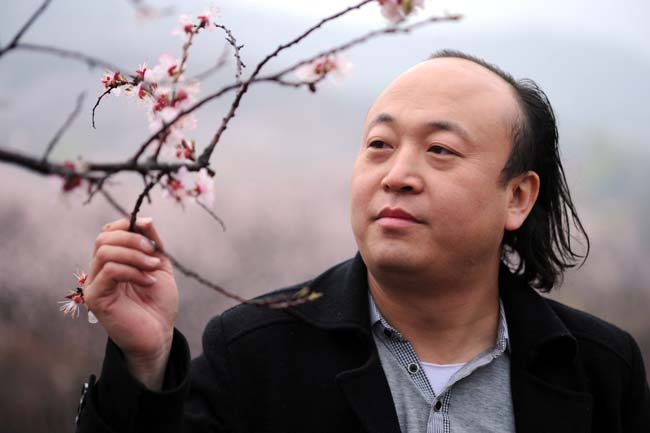 张翔洲相片--李明 摄