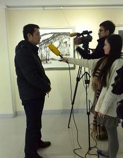 �λ������󵱴�����ˮī��������չ�����Ļ