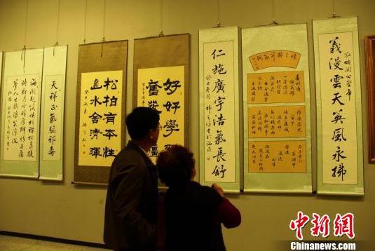 ���Ϻ��ھٰ������黭��������չ