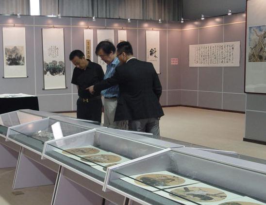 �����������浤��Ů�黭����Ʒ��չ