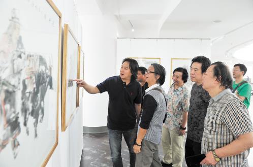 ��ɳ�����������������У������黭չ��ɳ��Ļ