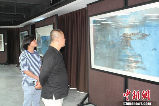 ����֮·�����ӵ�ˮī����Ʒչ����������Ļ