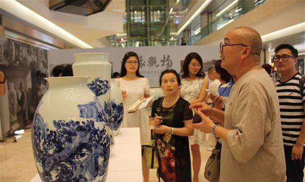 ����ǰ���λ������ˮī��������չ��26����Ļ