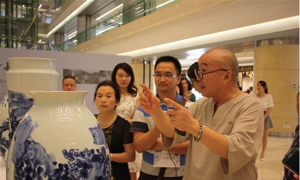 ����ǰ���λ������ˮī��������չ��26����Ļ