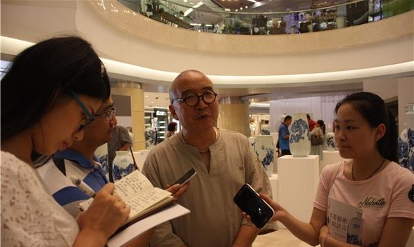 ����ǰ���λ������ˮī��������չ��26����Ļ