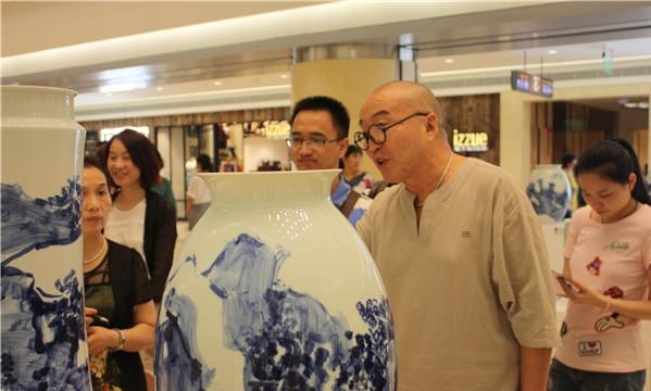 ����ǰ���λ������ˮī��������չ��26����Ļ