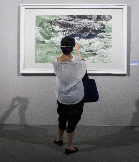 ����Ʒ������չ�ڱ�����������Ļ