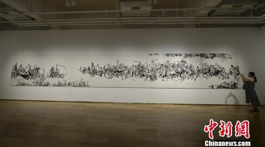 �˹����ں��ϳ�ɳ�ٰ������Ʒչ