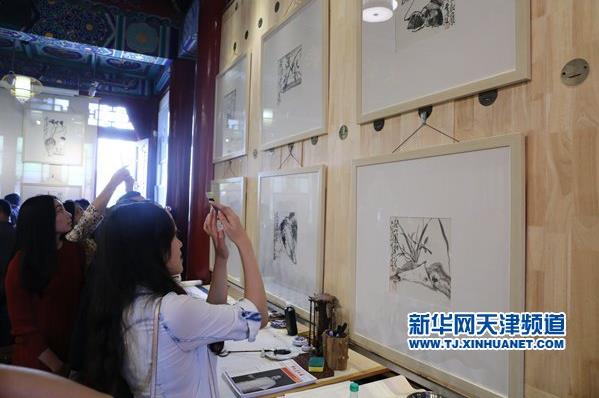 �ֹ㽡�黭��Ʒչ�ڽ���Ļ