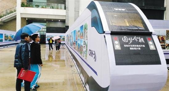 ���ϻ����������ɿ�ͨ��Ӱ�黭��Ʒչ��Ļ