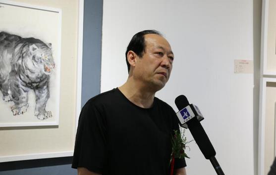 ����ɭ����СƷչ��һ������Ļ