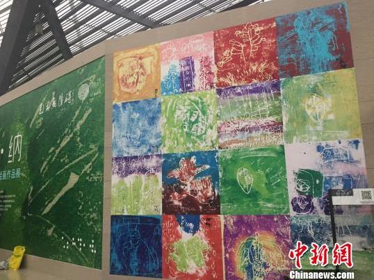 ���ںϽ����·�ʽ ä�˴����滭չ�㽭��Ļ