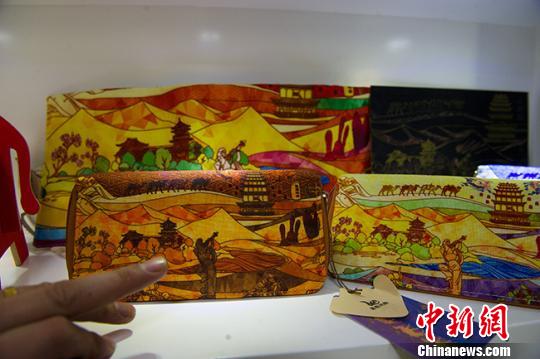 敦煌艺术“萌态”闯入时尚生活“受宠”