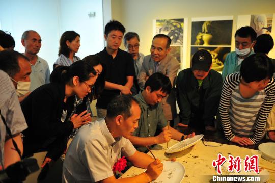 н���ഫ �������ִ��մ���Ʒչ������Ļ