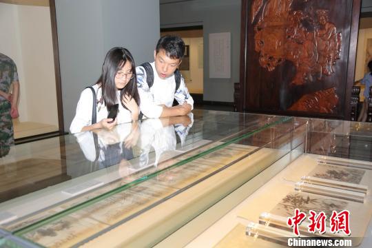 ���塰���ϻ��ɡ������ѻ��漣ɽ��չ��