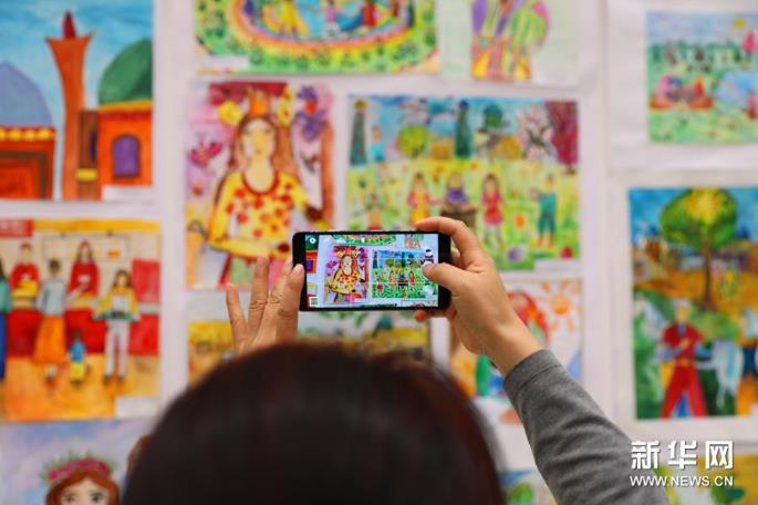 �Ϻ�������֯��Ա����ͯ�滭չ������ʲ��